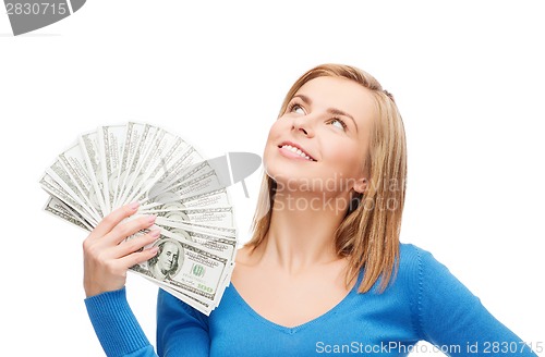 Image of smiling girl with dollar cash money