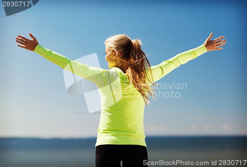 Image of woman doing sports outdoors