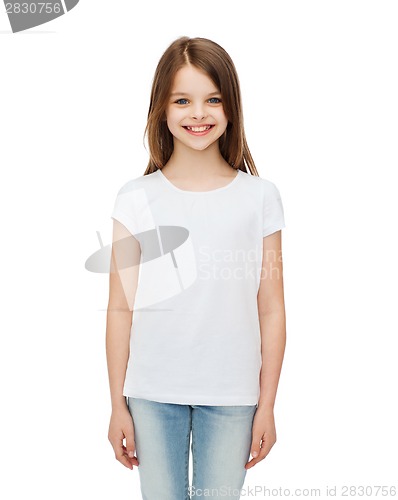 Image of smiling little girl in white blank t-shirt
