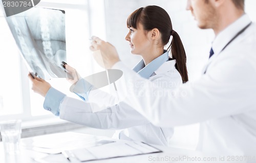 Image of doctor and nurse exploring x-ray