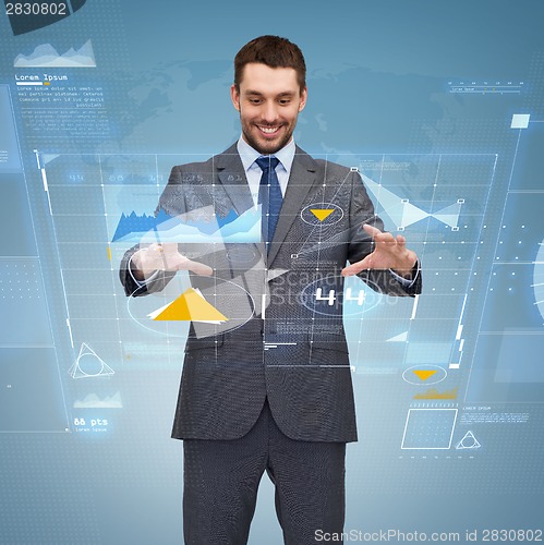 Image of businessman working with virtual screen