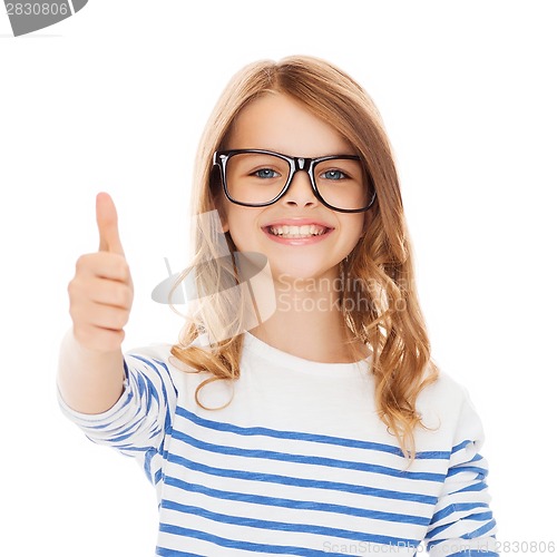 Image of little girl with black eyeglasses