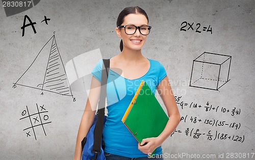 Image of smiling student with bag and folders