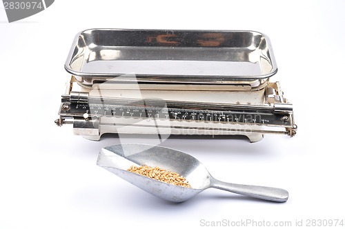 Image of Old kitchen scales on white