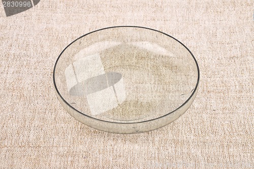 Image of Bowl of glass on linen