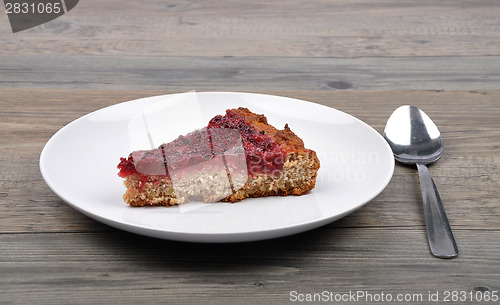 Image of Red currant cake on wood