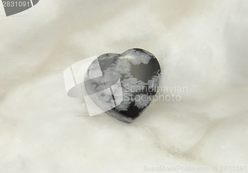 Image of Snowflake obsidian on cotton