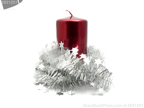 Image of Red candle with christmas decoration