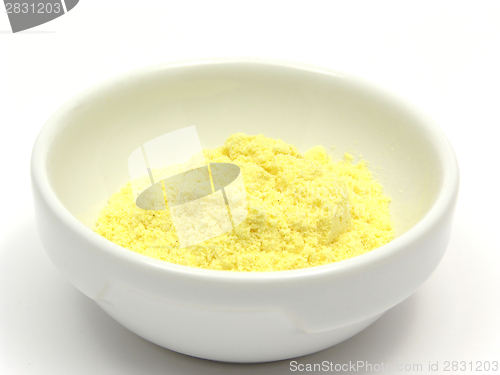 Image of Cornmeal  in a bowl of chinaware on white background