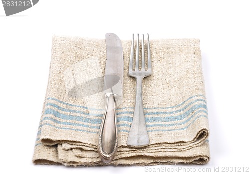 Image of Ancient cutlery on linen