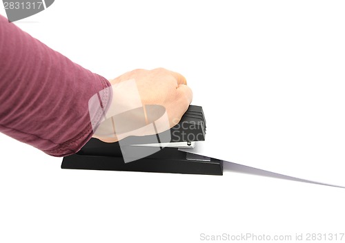Image of Stapler with sheet of paper