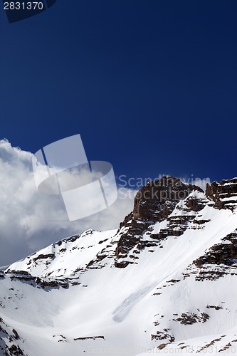 Image of Snowy rocks with traces from avalanche