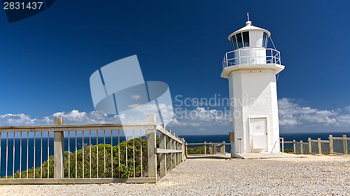 Image of A White Lighthouse at the sea