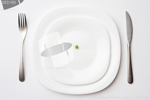 Image of place setting with pea