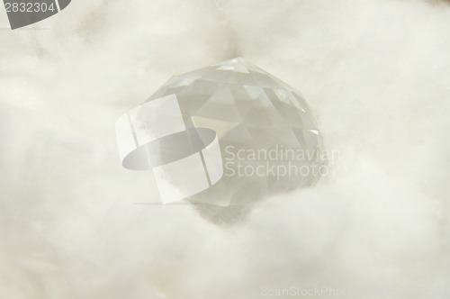 Image of Ball of glass in cotton