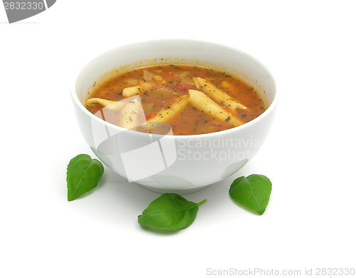 Image of Noodle soup with tomatoes and herbs on white