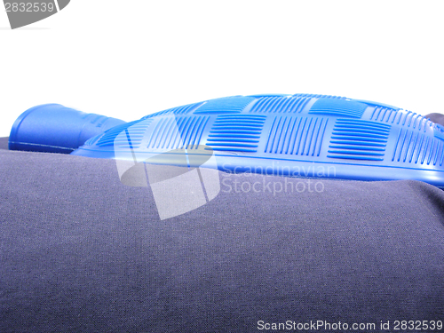 Image of Blue hot-water bag on a blue pillow