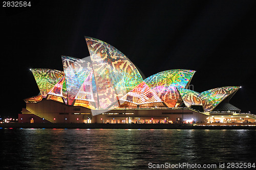 Image of Colourful reptile snake pattern on Sydney Oper House during Vivi