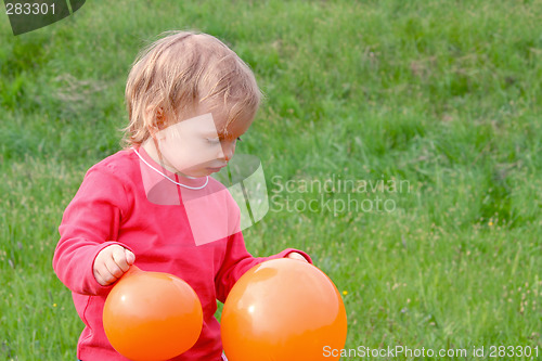 Image of Baby and balloons
