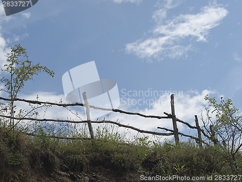 Image of Sky, clouds and old wooden fence