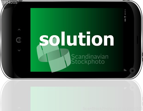 Image of smartphone with word solution on display, business concept