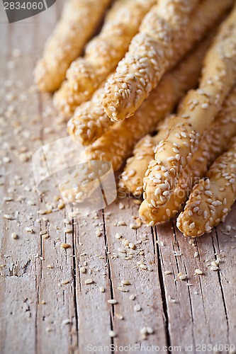 Image of bread sticks grissini with sesame seeds