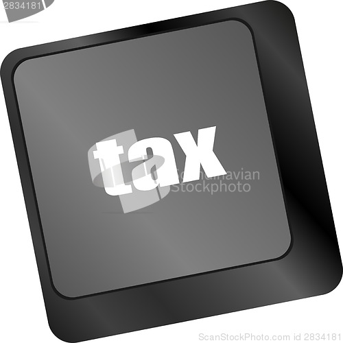 Image of tax word on laptop keyboard key, business concept,