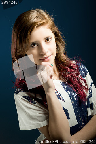 Image of Studio portrait of young beautiful girl