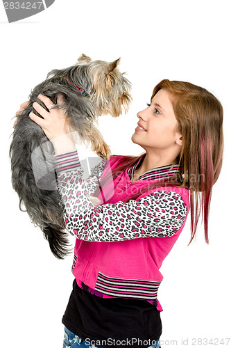 Image of smiling young girl with her pet yorkshire