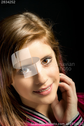 Image of Studio portrait of young beautiful girl