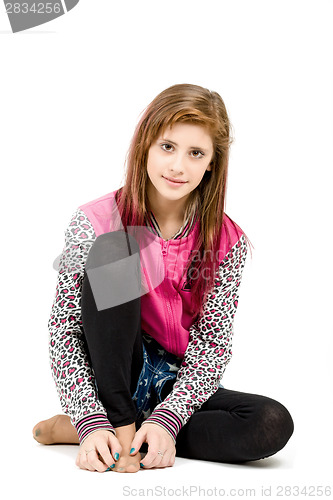 Image of sitting fashion portrait of young beautiful girl