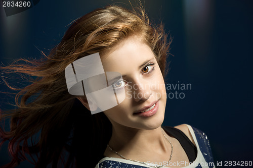 Image of Studio portrait of young beautiful girl