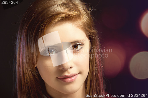 Image of Studio portrait of young beautiful girl