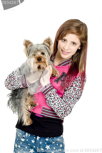 Image of smiling young girl with her pet yorkshire