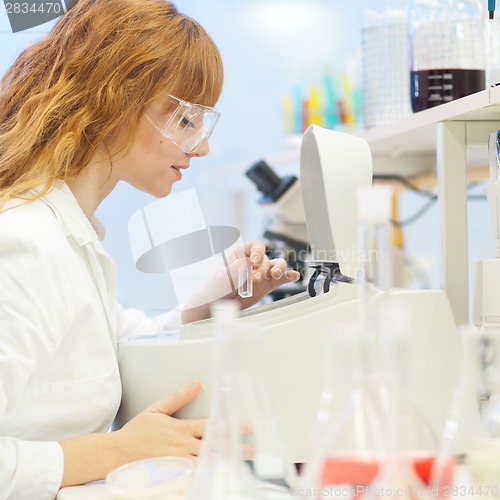 Image of Young chemist in the laboratory.