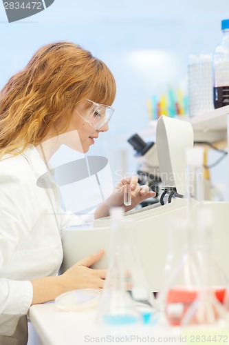 Image of Young chemist in the laboratory.