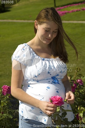 Image of Content pregnant woman