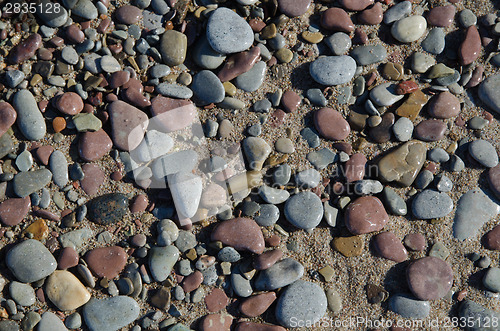 Image of Background of wet pebbles and sand