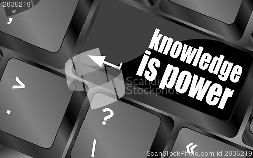 Image of knowledge is power button on computer keyboard key