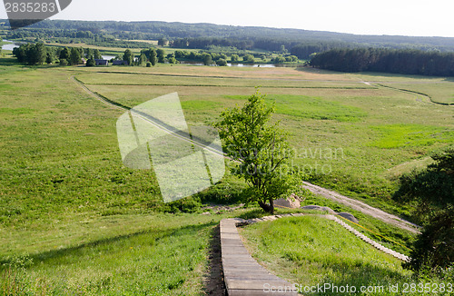 Image of landscape from hill in river, fields in summer  