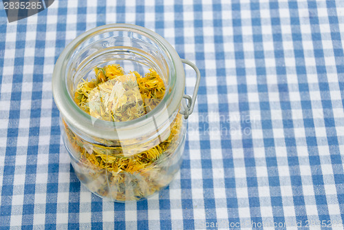 Image of jar of dried organic herbal healing calendula 
