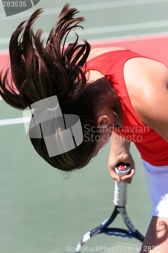 Image of Girl Playing Tennis