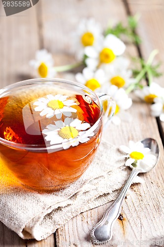 Image of cup of tea with chamomile flowers