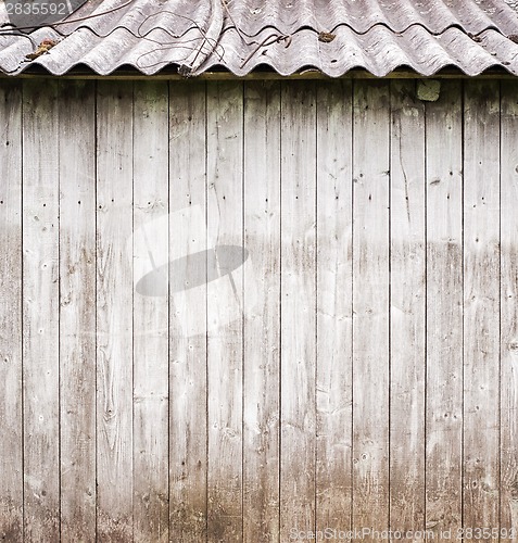 Image of grey wooden plank wall