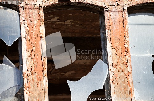 Image of Wall of old destroyed house with broken windows