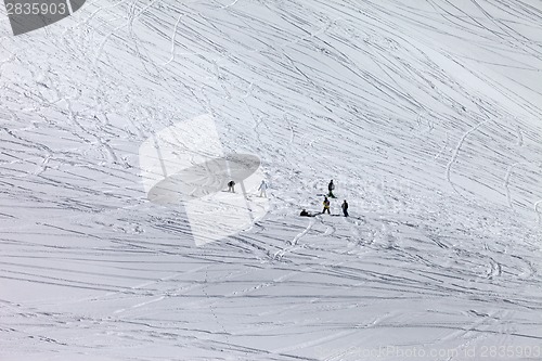 Image of Snowboarders and skiers on off-piste slope