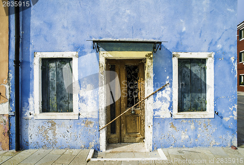 Image of Bright blue color house in Venice