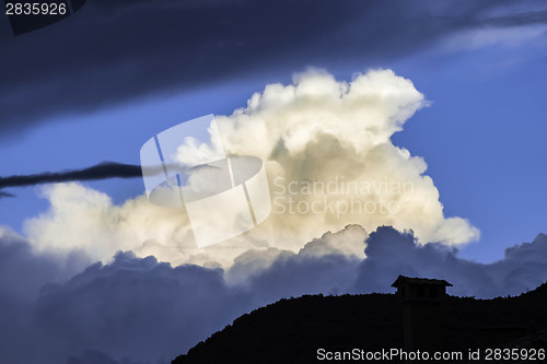 Image of Dramatic clouds and deep blue sky