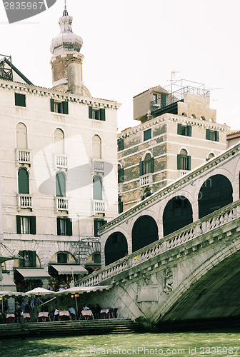 Image of Ancient buildings and boats in the channel in Venice