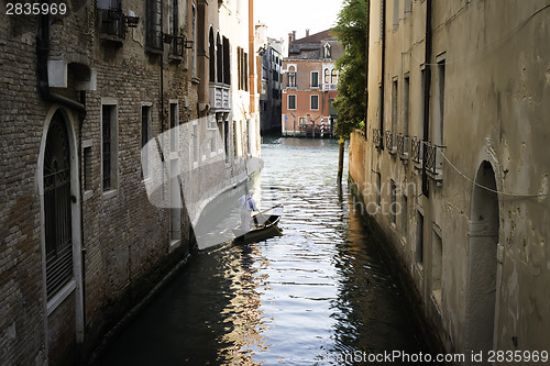 Image of Man on a boat in Venice